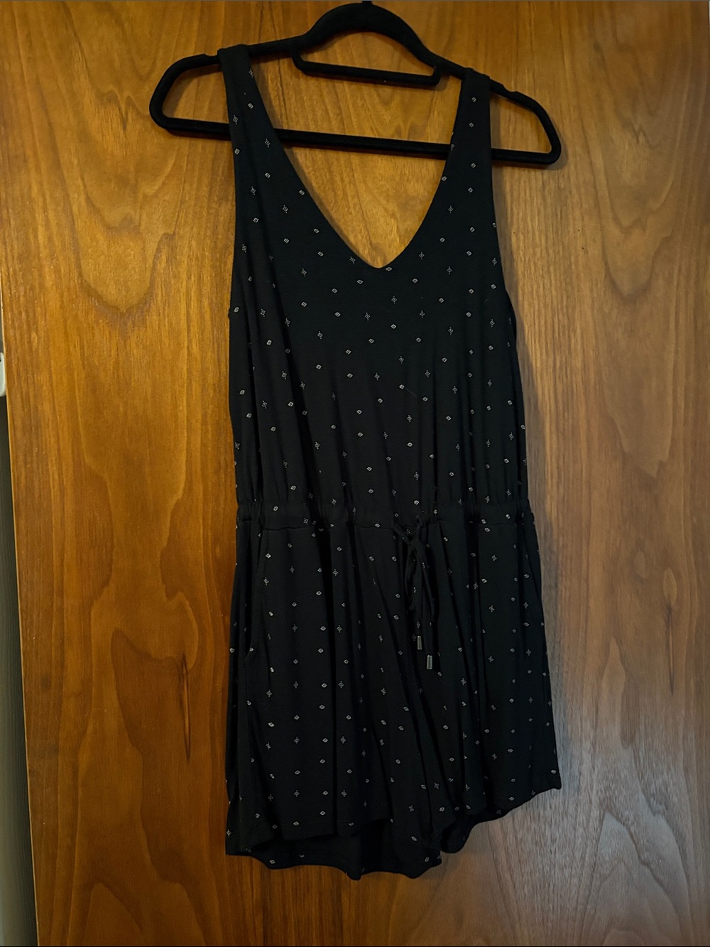 Denver Hayes Black Sleeveless Romper with Subtle Dot Print